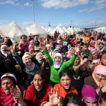 Syrian refugees protest against President Bashar al-Assad